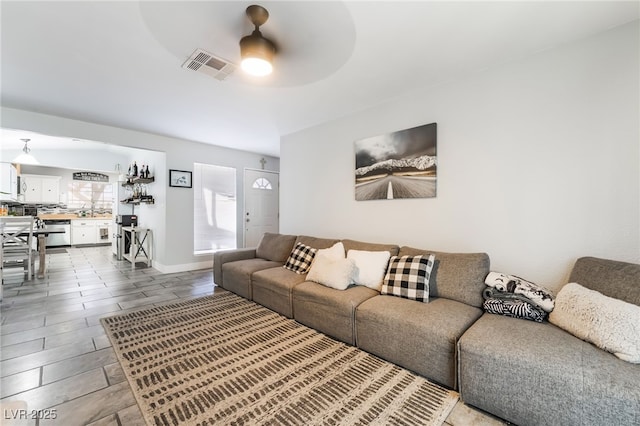 405 Box Elder Way, Henderson, NV 89015 - living room with a ceiling fan and baseboards