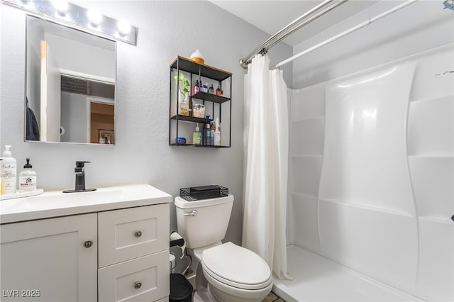 405 Box Elder Way, Henderson, NV 89015 - bathroom featuring vanity, a shower with shower curtain, and a textured wall