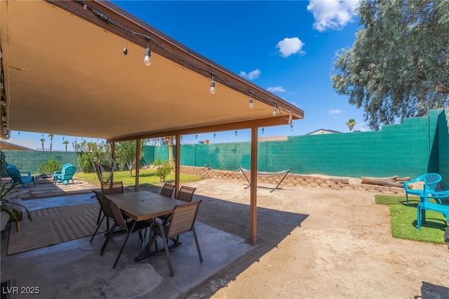 405 Box Elder Way, Henderson, NV 89015 - fenced backyard featuring a patio and outdoor dining space