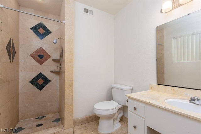 922 Westminster Ave, Las Vegas, NV 89119 - bathroom with vanity, a tile shower, and tile patterned flooring
