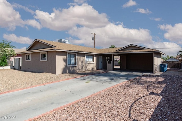 922 Westminster Ave, Las Vegas, NV 89119 - single story home with concrete driveway, an attached carport, and stucco siding