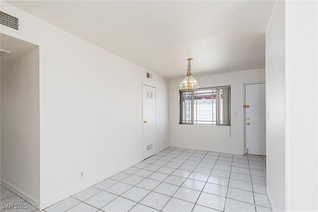 922 Westminster Ave, Las Vegas, NV 89119 - spare room with baseboards and light tile patterned flooring