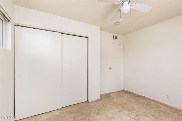 922 Westminster Ave, Las Vegas, NV 89119 - unfurnished bedroom with a closet and a ceiling fan