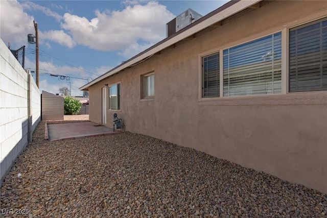 922 Westminster Ave, Las Vegas, NV 89119 - view of home's exterior with stucco siding and a patio