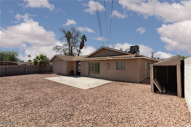 922 Westminster Ave, Las Vegas, NV 89119 - back of property with a patio and stucco siding