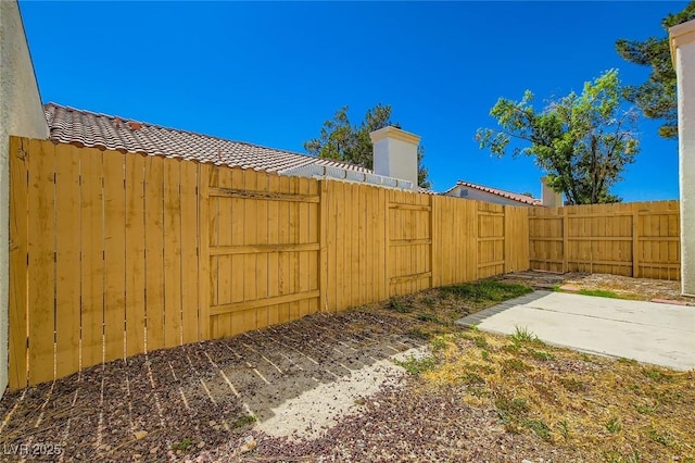 5425 Comchec Way Unit 103, Las Vegas, NV 89108 - fenced backyard featuring a patio