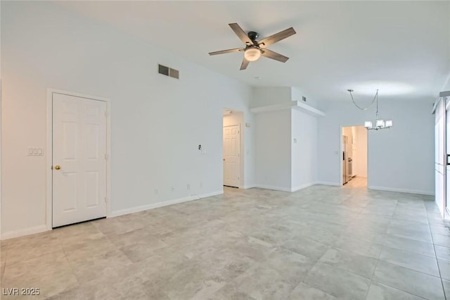 5425 Comchec Way Unit 103, Las Vegas, NV 89108 - unfurnished living room featuring a ceiling fan, a chandelier, and lofted ceiling