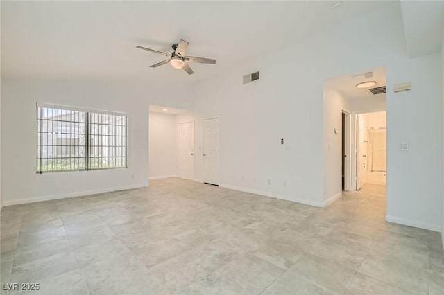 5425 Comchec Way Unit 103, Las Vegas, NV 89108 - empty room with a ceiling fan and vaulted ceiling