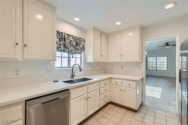 5425 Comchec Way Unit 103, Las Vegas, NV 89108 - kitchen with dishwasher, ceiling fan, light tile patterned floors, plenty of natural light, and recessed lighting