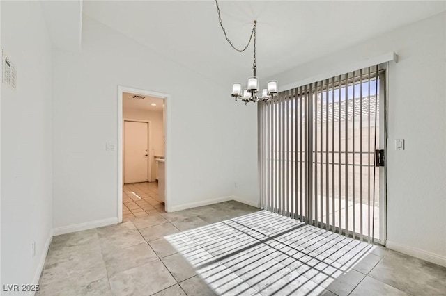 5425 Comchec Way Unit 103, Las Vegas, NV 89108 - tiled empty room with a chandelier and baseboards
