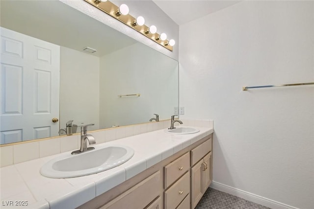 5425 Comchec Way Unit 103, Las Vegas, NV 89108 - bathroom featuring double vanity and tile patterned floors