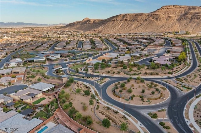 6804 Regency Stone Way, Las Vegas, NV 89148 - aerial view of property's location with a mountainous background and nearby suburban area
