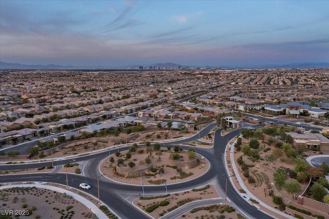 6804 Regency Stone Way, Las Vegas, NV 89148 - aerial view of property and surrounding area with nearby suburban area and mountains