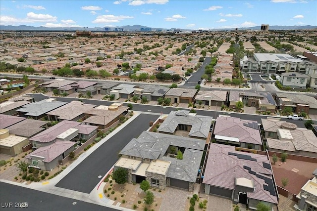 6804 Regency Stone Way, Las Vegas, NV 89148 - aerial perspective of suburban area with a mountainous background
