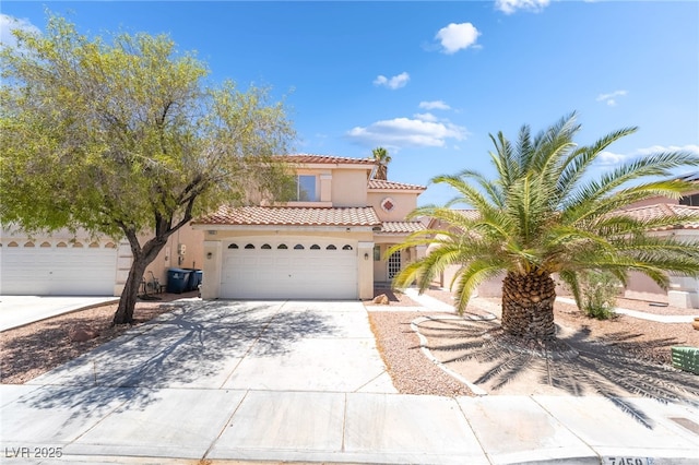 7459 Aurora Glow St, Las Vegas, NV 89139 - mediterranean / spanish house featuring stucco siding, concrete driveway, and a tile roof