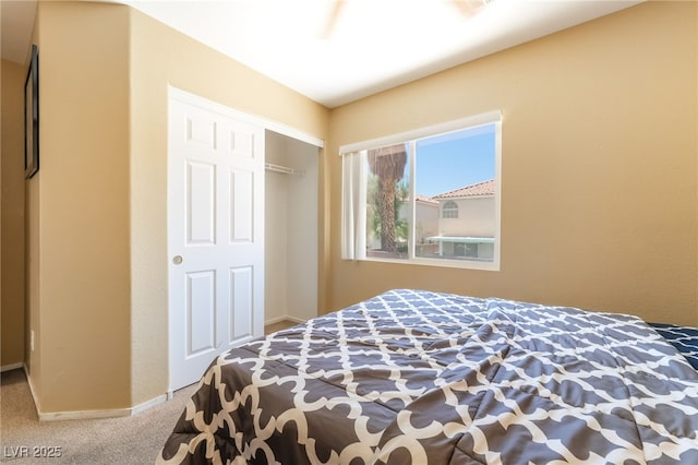 7459 Aurora Glow St, Las Vegas, NV 89139 - carpeted bedroom featuring baseboards and a closet