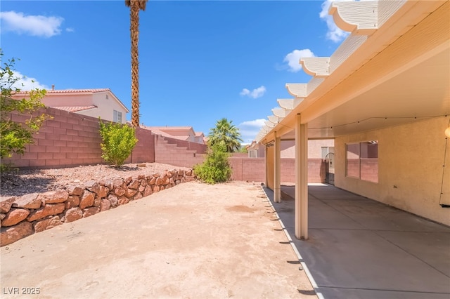 7459 Aurora Glow St, Las Vegas, NV 89139 - fenced backyard featuring a patio