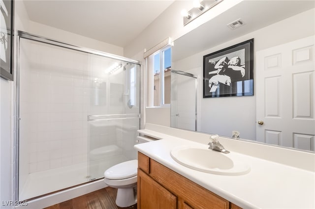 7459 Aurora Glow St, Las Vegas, NV 89139 - full bath featuring vanity, a stall shower, and wood finished floors