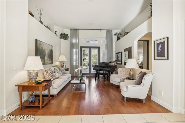 613 Pinnacle Heights Ln, Las Vegas, NV 89144 - living area featuring hardwood / wood-style floors and arched walkways