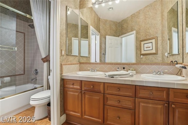 613 Pinnacle Heights Ln, Las Vegas, NV 89144 - full bathroom with double vanity, washtub / shower combination, and backsplash
