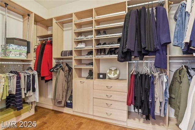 613 Pinnacle Heights Ln, Las Vegas, NV 89144 - spacious closet featuring wood finished floors