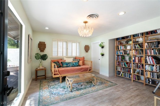 200 Stonewood Ct, Las Vegas, NV 89107 - living area featuring wood finished floors, a chandelier, and recessed lighting