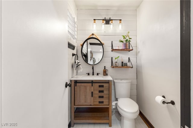 200 Stonewood Ct, Las Vegas, NV 89107 - half bath featuring vanity, tile walls, and tile patterned floors