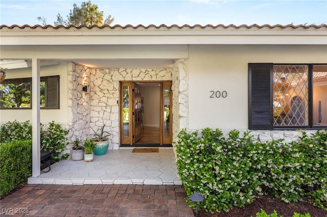 200 Stonewood Ct, Las Vegas, NV 89107 - doorway to property with stone siding and stucco siding