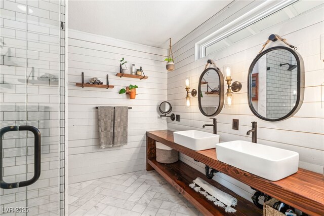 200 Stonewood Ct, Las Vegas, NV 89107 - bathroom featuring a tile shower and double vanity
