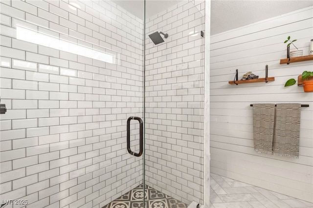 200 Stonewood Ct, Las Vegas, NV 89107 - bathroom with a shower stall, marble look tile flooring, and wooden walls