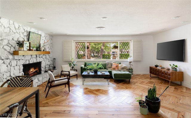 200 Stonewood Ct, Las Vegas, NV 89107 - living room featuring a stone fireplace and baseboards