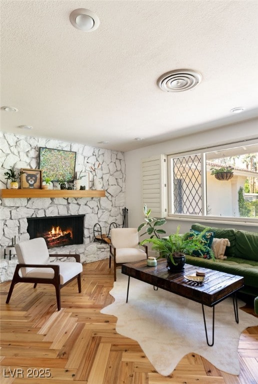 200 Stonewood Ct, Las Vegas, NV 89107 - living room with a fireplace and a textured ceiling