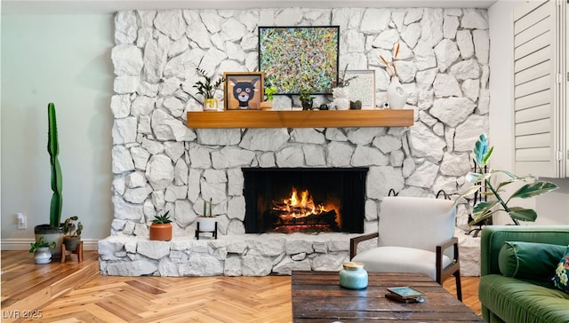 200 Stonewood Ct, Las Vegas, NV 89107 - living area featuring a stone fireplace and baseboards