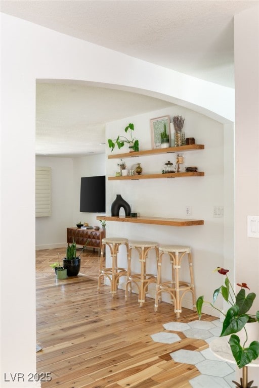 200 Stonewood Ct, Las Vegas, NV 89107 - indoor dry bar featuring wood finished floors