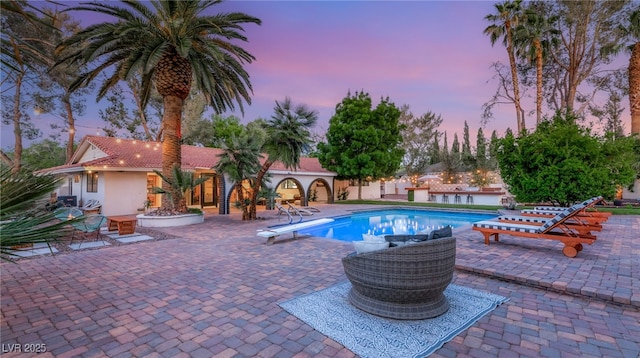 200 Stonewood Ct, Las Vegas, NV 89107 - outdoor pool featuring a patio and a diving board