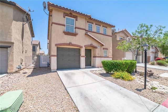 7216 Liberty Pride St, Las Vegas, NV 89148 - mediterranean / spanish-style house with a gate, stucco siding, a garage, a tiled roof, and driveway
