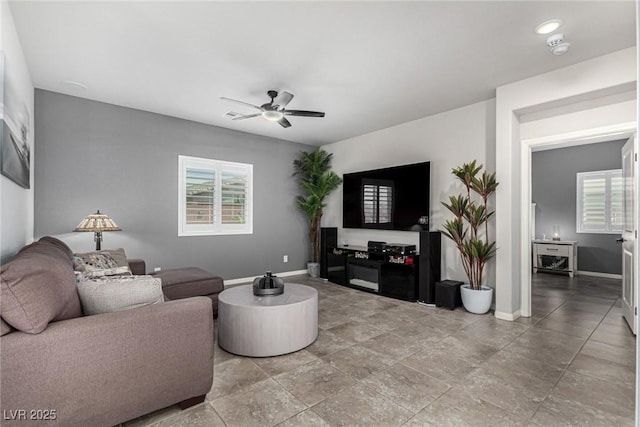 146 E Hawk Ave, Pahrump, NV 89060 - living area with a ceiling fan and baseboards