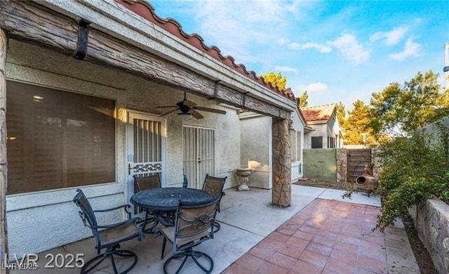 2253 Van Gogh Dr, Henderson, NV 89074 - view of patio / terrace featuring a ceiling fan and outdoor dining area