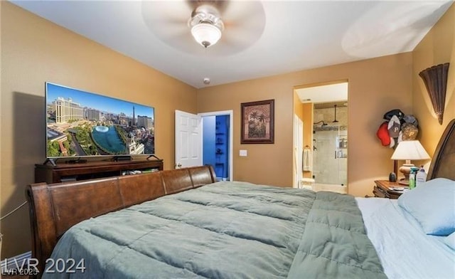2253 Van Gogh Dr, Henderson, NV 89074 - bedroom with a ceiling fan and ensuite bath