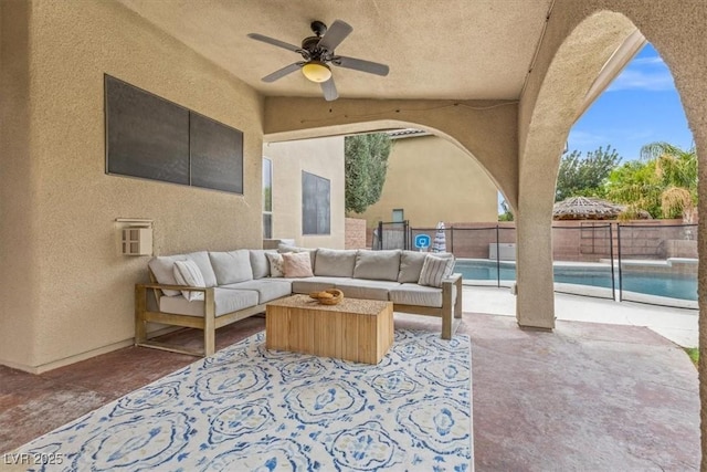 8929 Monte Oro Dr, Las Vegas, NV 89131 - fenced backyard featuring a ceiling fan, a patio, and outdoor lounge area