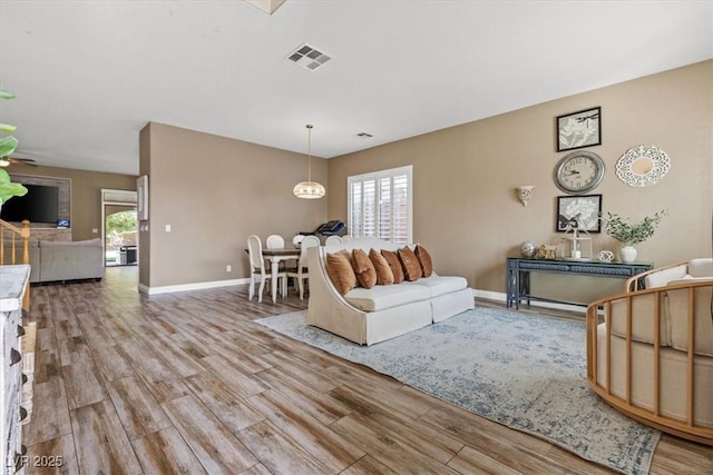 8929 Monte Oro Dr, Las Vegas, NV 89131 - living area featuring healthy amount of natural light and light wood-style flooring