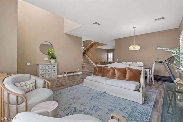 8929 Monte Oro Dr, Las Vegas, NV 89131 - living area featuring wood finished floors and stairway