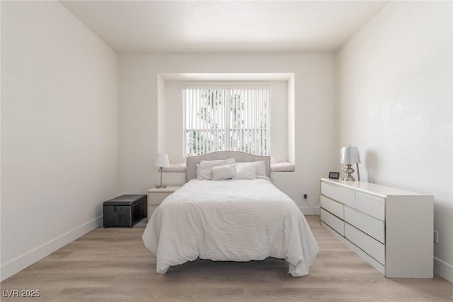 5228 Painted Lakes Way, Las Vegas, NV 89149 - bedroom with light wood finished floors and baseboards