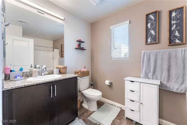 2620 Canary Yellow Ct, North Las Vegas, NV 89086 - full bathroom featuring vanity, wood finished floors, and curtained shower