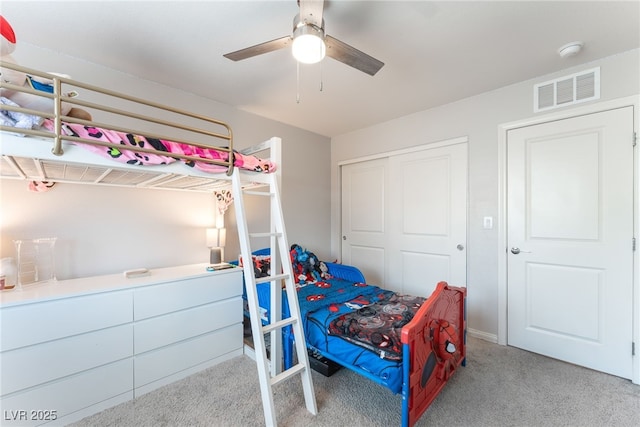 2620 Canary Yellow Ct, North Las Vegas, NV 89086 - carpeted bedroom with a closet and a ceiling fan