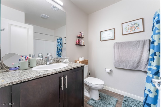 2620 Canary Yellow Ct, North Las Vegas, NV 89086 - bathroom with wood finished floors, vanity, and a shower with curtain