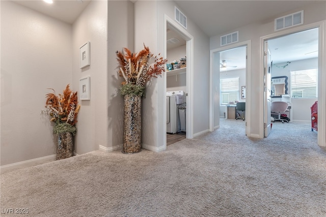 2620 Canary Yellow Ct, North Las Vegas, NV 89086 - hall with independent washer and dryer, a desk, and carpet flooring