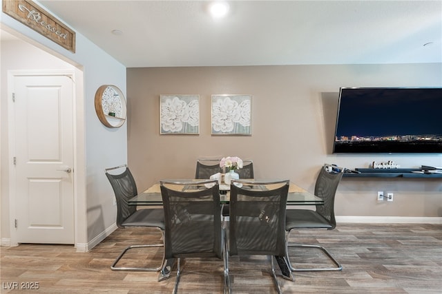 2620 Canary Yellow Ct, North Las Vegas, NV 89086 - dining space with wood finished floors and baseboards