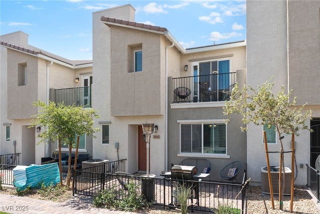 2620 Canary Yellow Ct, North Las Vegas, NV 89086 - multi unit property with a balcony and stucco siding