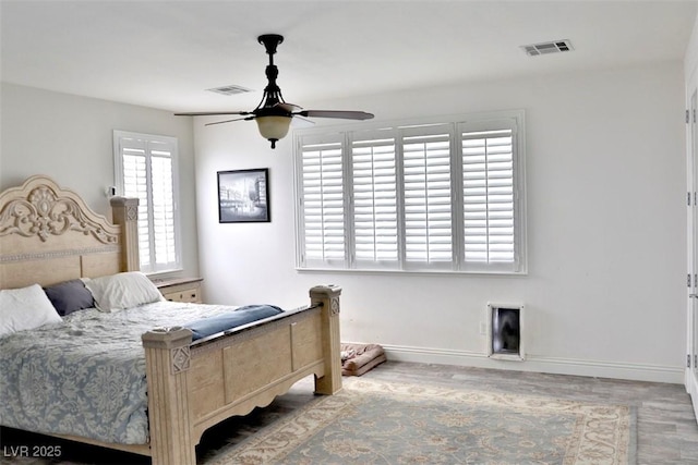 11240 Romette Ct, Las Vegas, NV 89141 - bedroom with wood finished floors and ceiling fan
